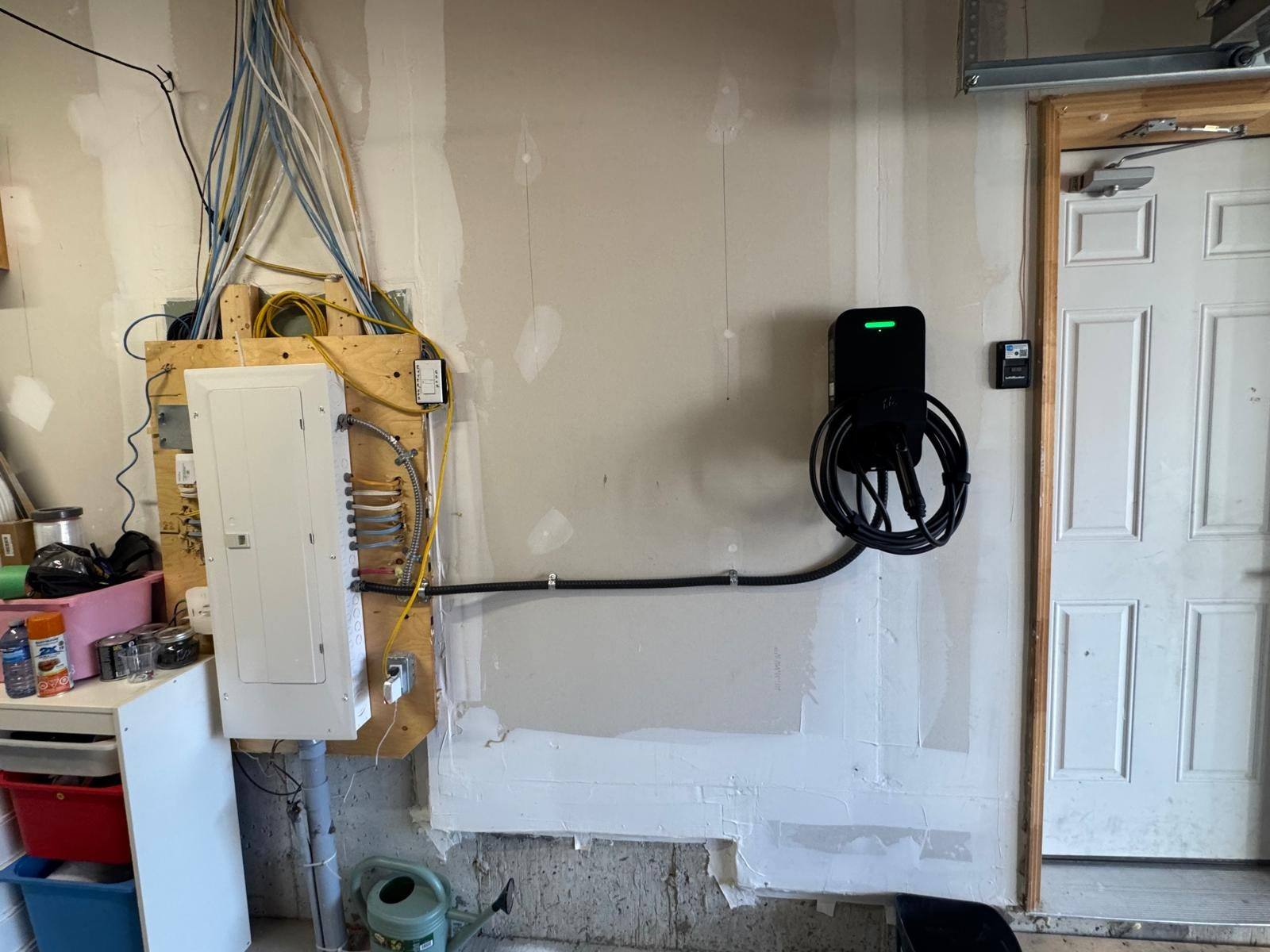 Sleek modern Level 2 EV charger installation in a residential garage